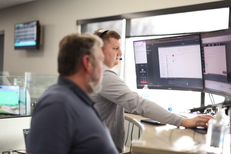 Technician securing network systems against AI cybersecurity risks