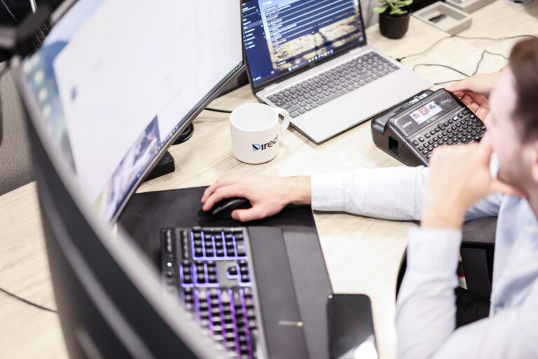 Employees learning how to mitigate AI cybersecurity risks in the workplace