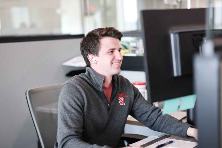 Employee using managed IT help desk support on a mobile phone