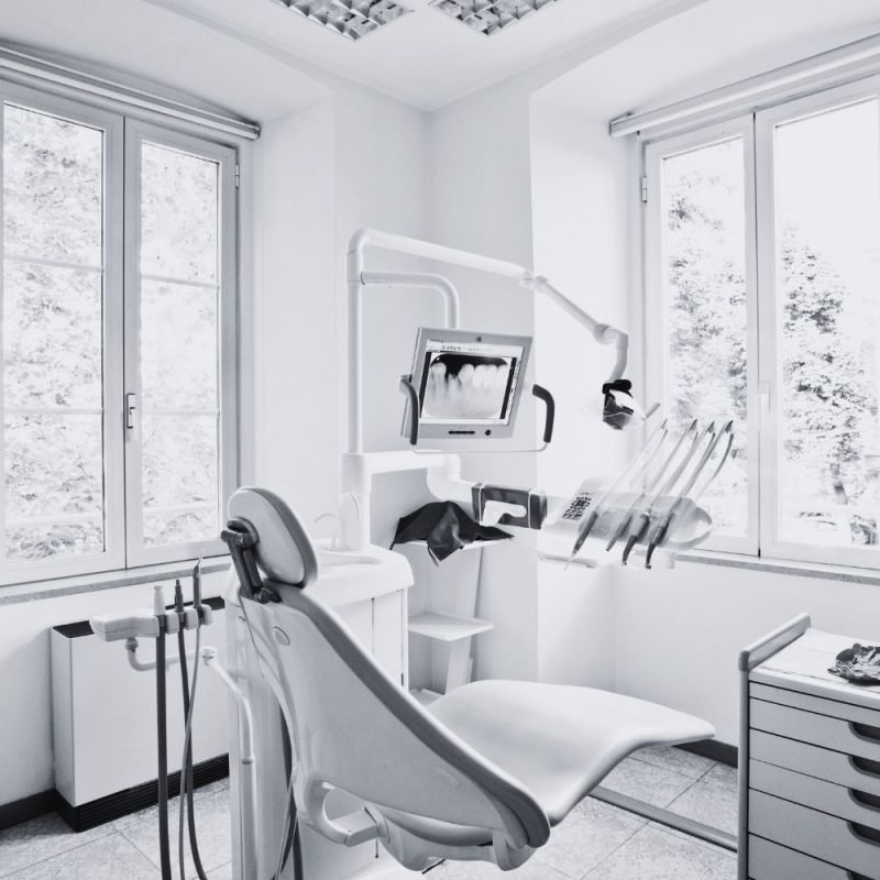 Modern dental operatory with digital imaging equipment and connected dental technology.