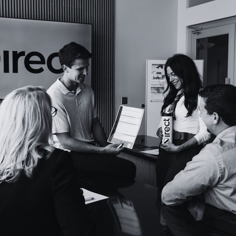 Workplace by Direct team members discussing business technology needs for Mitchell organizations